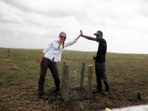 Kathleen and Jerry (field assistant) complete exclosure installation at a one of the Decagon study field sites.
