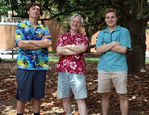 Clayton Wunderlich, Brian Tague, and Ethan Perellis under the Winston Hall Magnolias on Hawaiian Shirt Friday, Summer 2017 